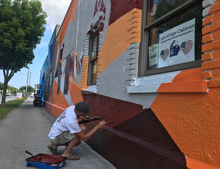 New mural features Alpena Flyer on Light of Hope Clubhouse News
